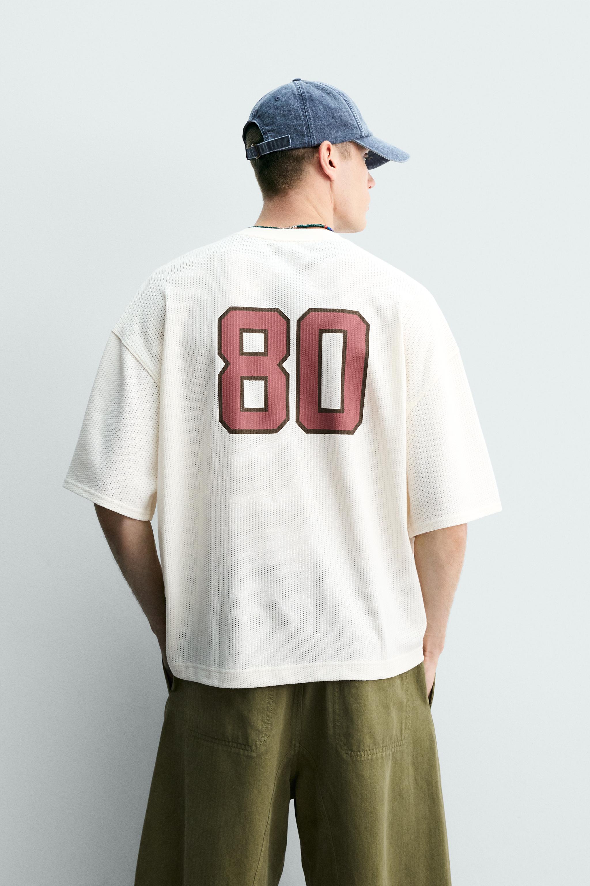 CONTRASTING PRINT TEXTURED T-SHIRT